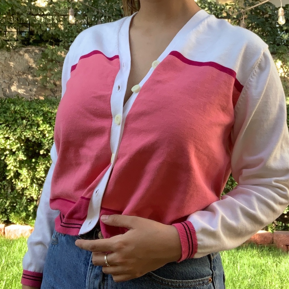pink and white cardigan